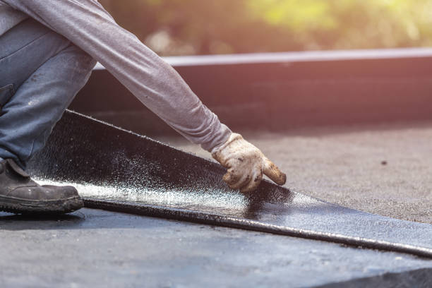 Professional Waterproofing technician working in DeWitt, MI